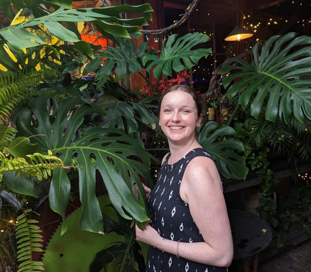 woman surrounded by plants